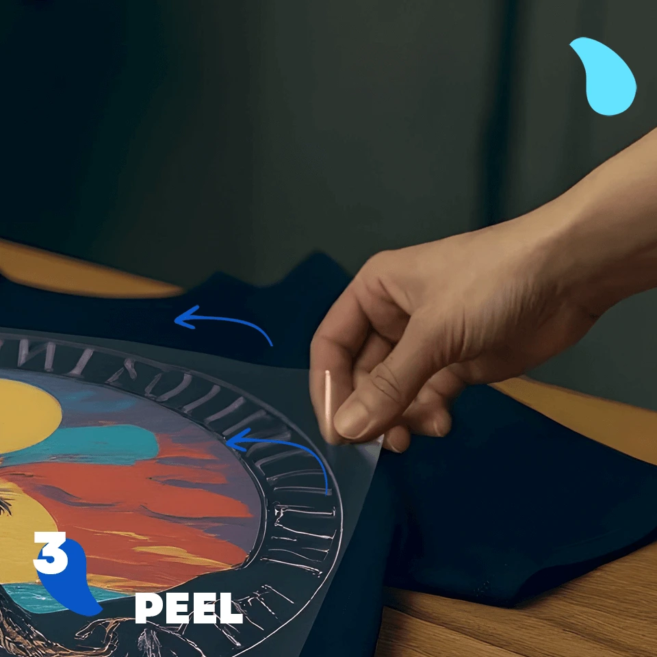 Step 3 - Peel: Peeling the clear carrier film off the t-shirt to reveal the finished design.